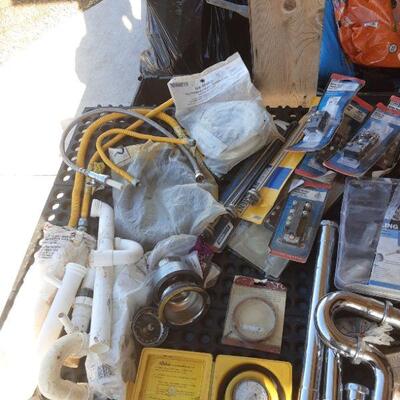 lot 265 - Box of assorted plumbing mostly in original pkg