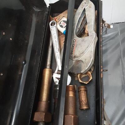 lot 267 Black metal tool box and contents, ext cord, airhose