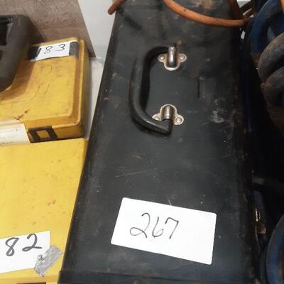 lot 267 Black metal tool box and contents, ext cord, airhose
