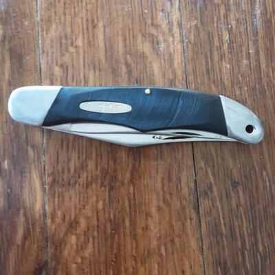 Buck 317 double blade knife and Calvin Hill mens/ladies watch set