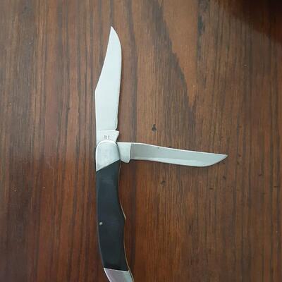 Buck 317 double blade knife and Calvin Hill mens/ladies watch set