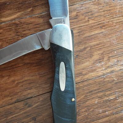 Buck 317 double blade knife and Calvin Hill mens/ladies watch set