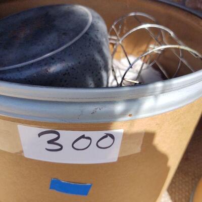 Round bin of assorted household
