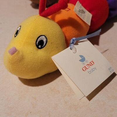 Lot 33: GUND Baby Squeeze and Light Color Worm + New YORRICK Plush Bear 