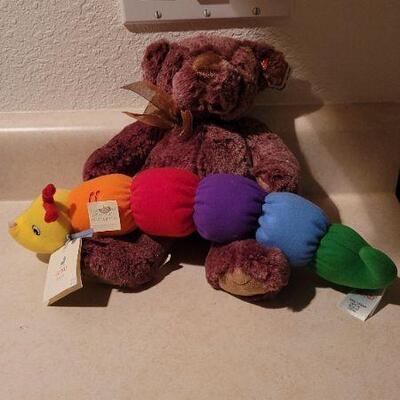 Lot 33: GUND Baby Squeeze and Light Color Worm + New YORRICK Plush Bear 