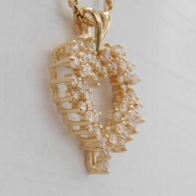 14 KT Gold Heart Pendant Accented by Cubic Zirconia with 24" 14KT Gold Rope Chain 13 grams