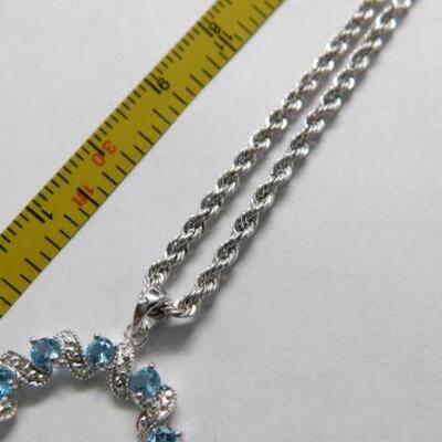 14 KT White Gold Circle Topaz and Diamond Pendant on 14KT Gold Rope Chain 4 grams