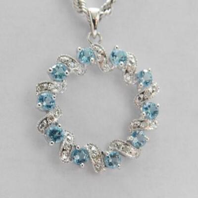 14 KT White Gold Circle Topaz and Diamond Pendant on 14KT Gold Rope Chain 4 grams