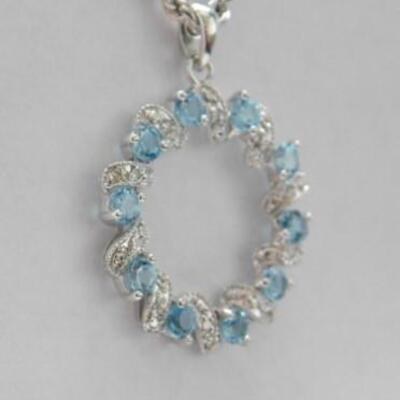 14 KT White Gold Circle Topaz and Diamond Pendant on 14KT Gold Rope Chain 4 grams