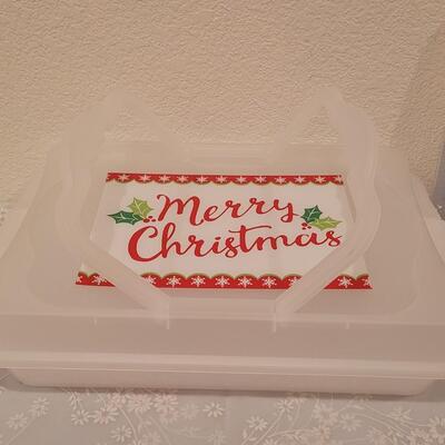 Lot 192: Light Up Wine Stopper, Plastic Treat Containers and Merry Christmas Cake Taker and Disposable Plates and Napkins