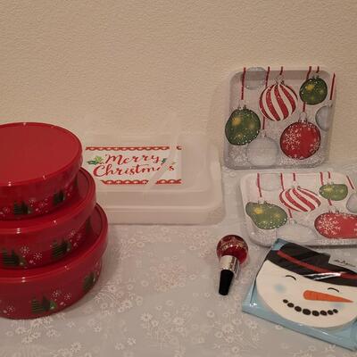 Lot 192: Light Up Wine Stopper, Plastic Treat Containers and Merry Christmas Cake Taker and Disposable Plates and Napkins