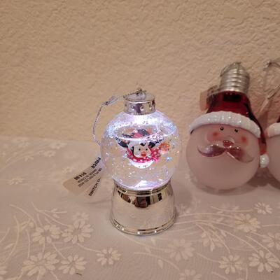 Lot 199: Light Up Christmas Globes and Santa Ornaments 
