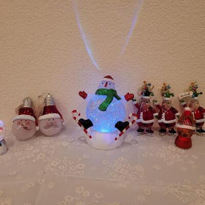 Lot 199: Light Up Christmas Globes and Santa Ornaments 