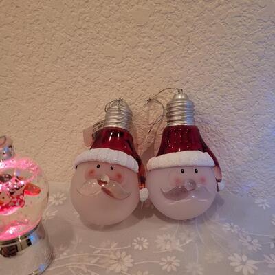 Lot 199: Light Up Christmas Globes and Santa Ornaments 