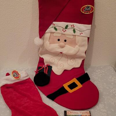 Lot 201: Extra Large Stocking, Soft Average Stocking and Christmas CD