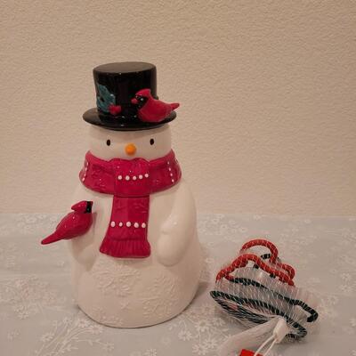 Lot 204: Snowman Cookie Jar and Cookie Cutters
