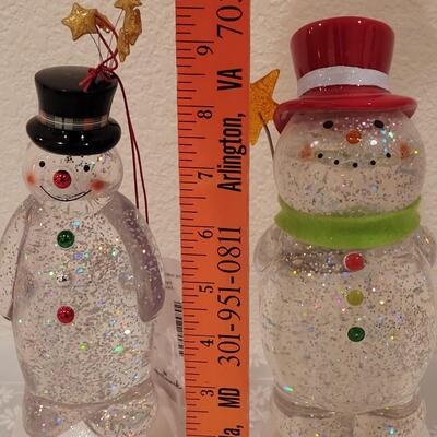 Lot 227: (2) Light up Snowmen (need new batteries)
