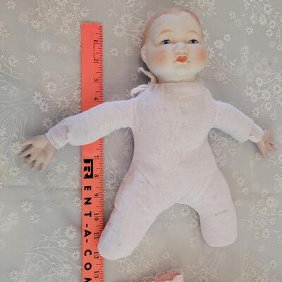 Lot 296: Handpainted China Dolls (one is missing a finger)