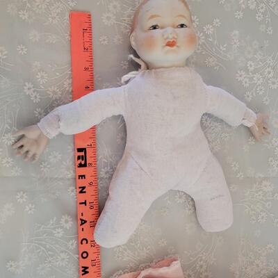 Lot 296: Handpainted China Dolls (one is missing a finger)