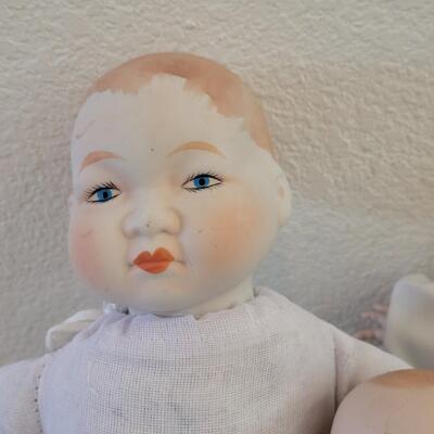 Lot 296: Handpainted China Dolls (one is missing a finger)