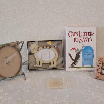Lot 319: Cat Photo Frames, Book and Paperclips