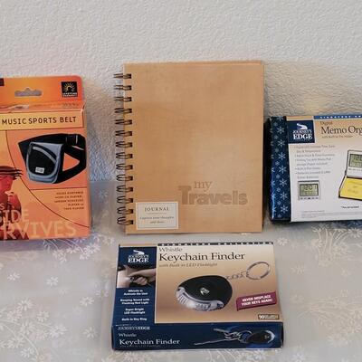 Lot 324: Memo Organizer, Journal, Music Sports Belt and Keychain Finder