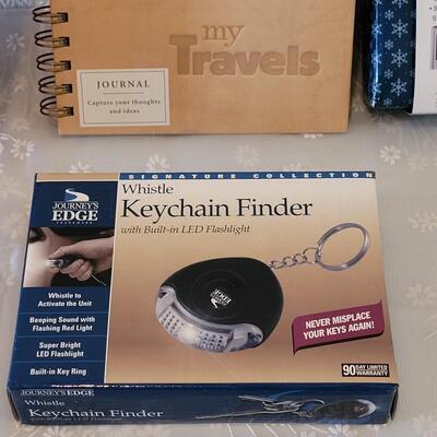 Lot 324: Memo Organizer, Journal, Music Sports Belt and Keychain Finder
