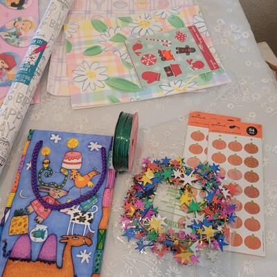 Lot 327: Wrapping Paper, Tissue Paper and Trimmings 