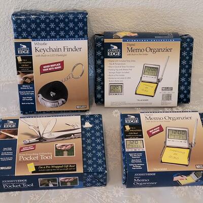 Lot 325: (2) Memo Organizer, Pocket Tool and Keychain Finder