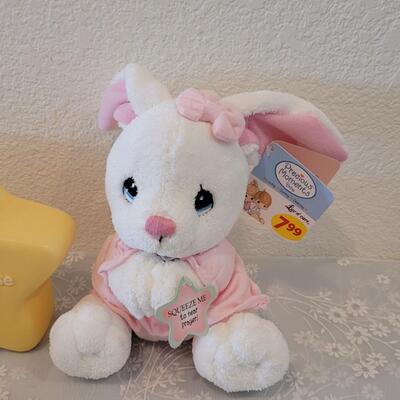 Lot 331: Precious Moments Prayer Bunny, Star Bank, Decorative Shoe and Musiacel Baby in Bassinet 