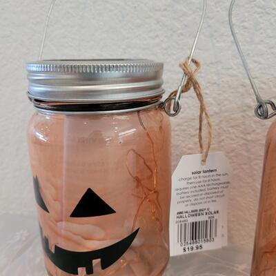 Lot 347: (2) Solar Pumpkin Jars