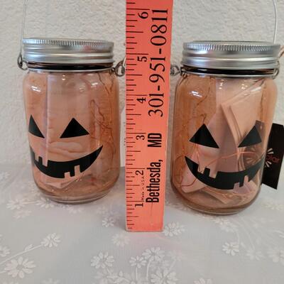 Lot 347: (2) Solar Pumpkin Jars