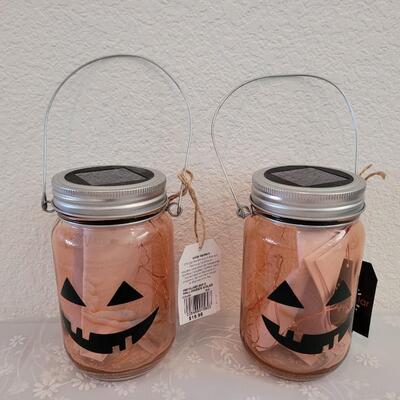 Lot 347: (2) Solar Pumpkin Jars