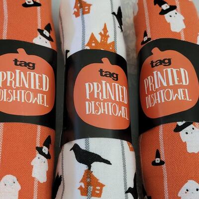 Lot 348: Halloween Dish Towels and Miracle Melting Spooky Ghosts