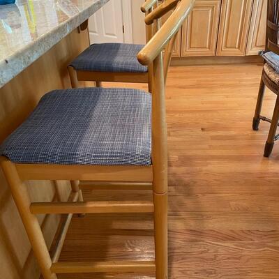 Two bar stools with custom cushions