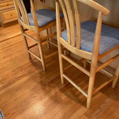 Two bar stools with custom cushions