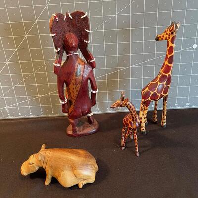 #143 Wood Carved African: Human, Giraffe, Hippo