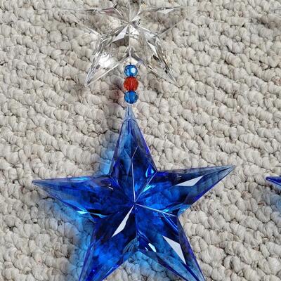 Lot 11: Red, White and Blue Hanging Decorations (4 Star Strands and 4 Puff Hearts)