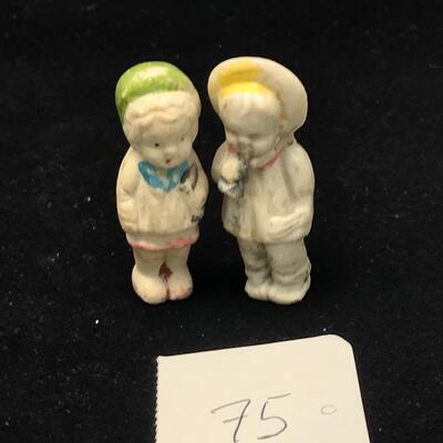Bisque Boy and Girl. Unmarked 