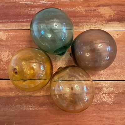 LOT 52 - Four Floating Glass Orbs, Multiple Colors