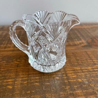 LOT 70 - America Cut Glass Trio of Liquid Serving Vessels, Oil Cruet, Creamer and Small Pitcher. 