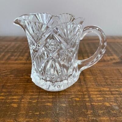 LOT 70 - America Cut Glass Trio of Liquid Serving Vessels, Oil Cruet, Creamer and Small Pitcher. 