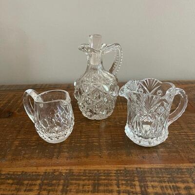 LOT 70 - America Cut Glass Trio of Liquid Serving Vessels, Oil Cruet, Creamer and Small Pitcher. 