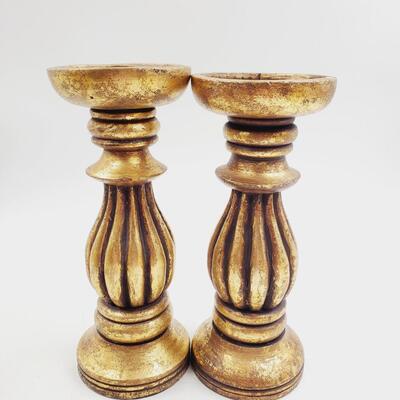 GOLD COLORED PILLAR CANDLE HOLDERS SET OF 4