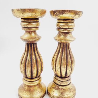 GOLD COLORED PILLAR CANDLE HOLDERS SET OF 4
