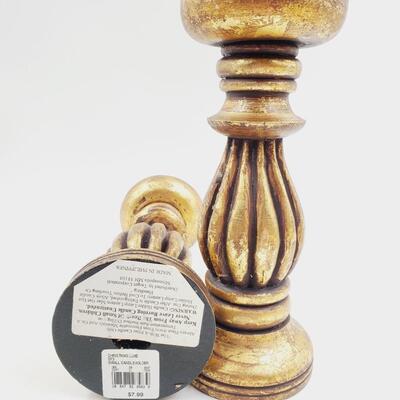 GOLD COLORED PILLAR CANDLE HOLDERS SET OF 4