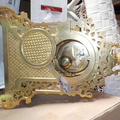 19 Century French Table clock with gilt and European design.