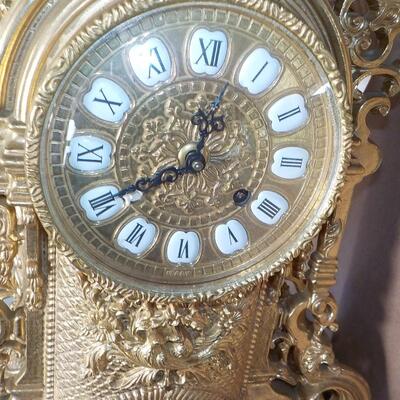 19 Century French Table clock with gilt and European design.