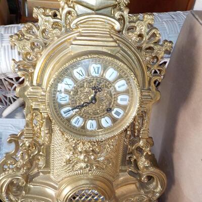 19 Century French Table clock with gilt and European design.