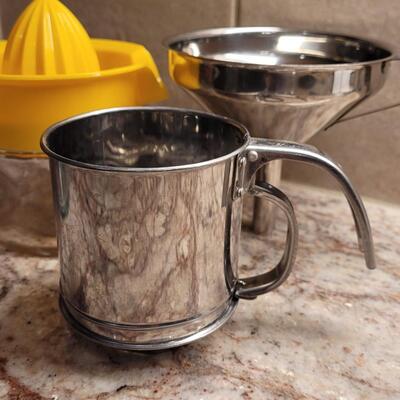 Lot 3: Measuring Cups, Sifter, Funnel and Juicer 